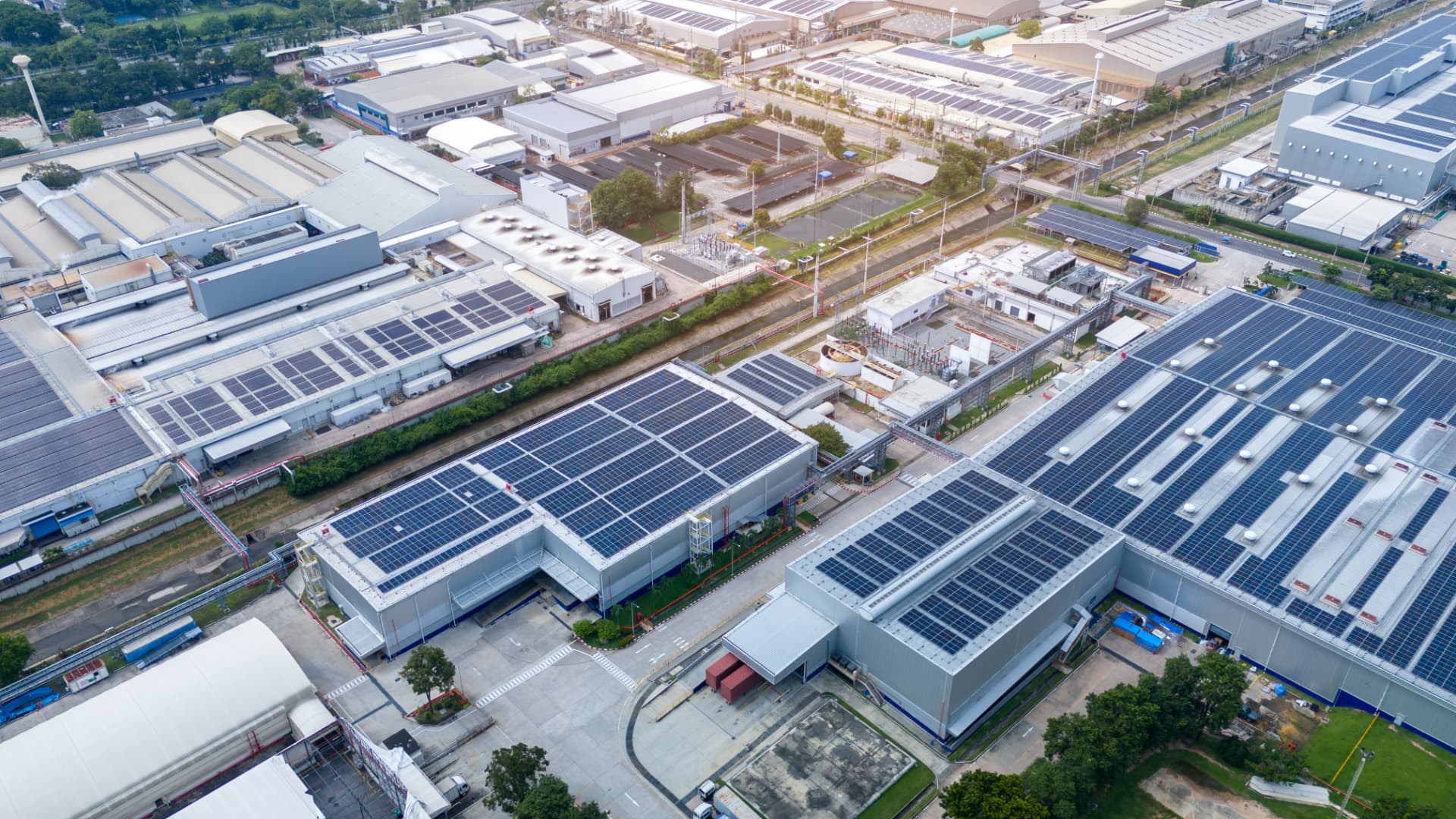 Aerial view of solar panels on an industrial facility