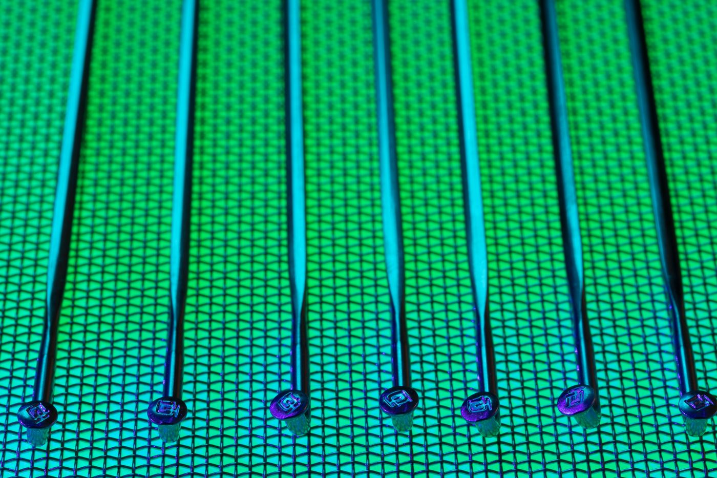 Patterned silicon wafer in green and blue